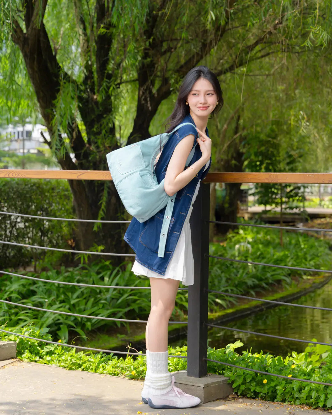 SIGNATURE POCKET HOBO BAG IN LIGHT WASH DENIM TSL Singapore