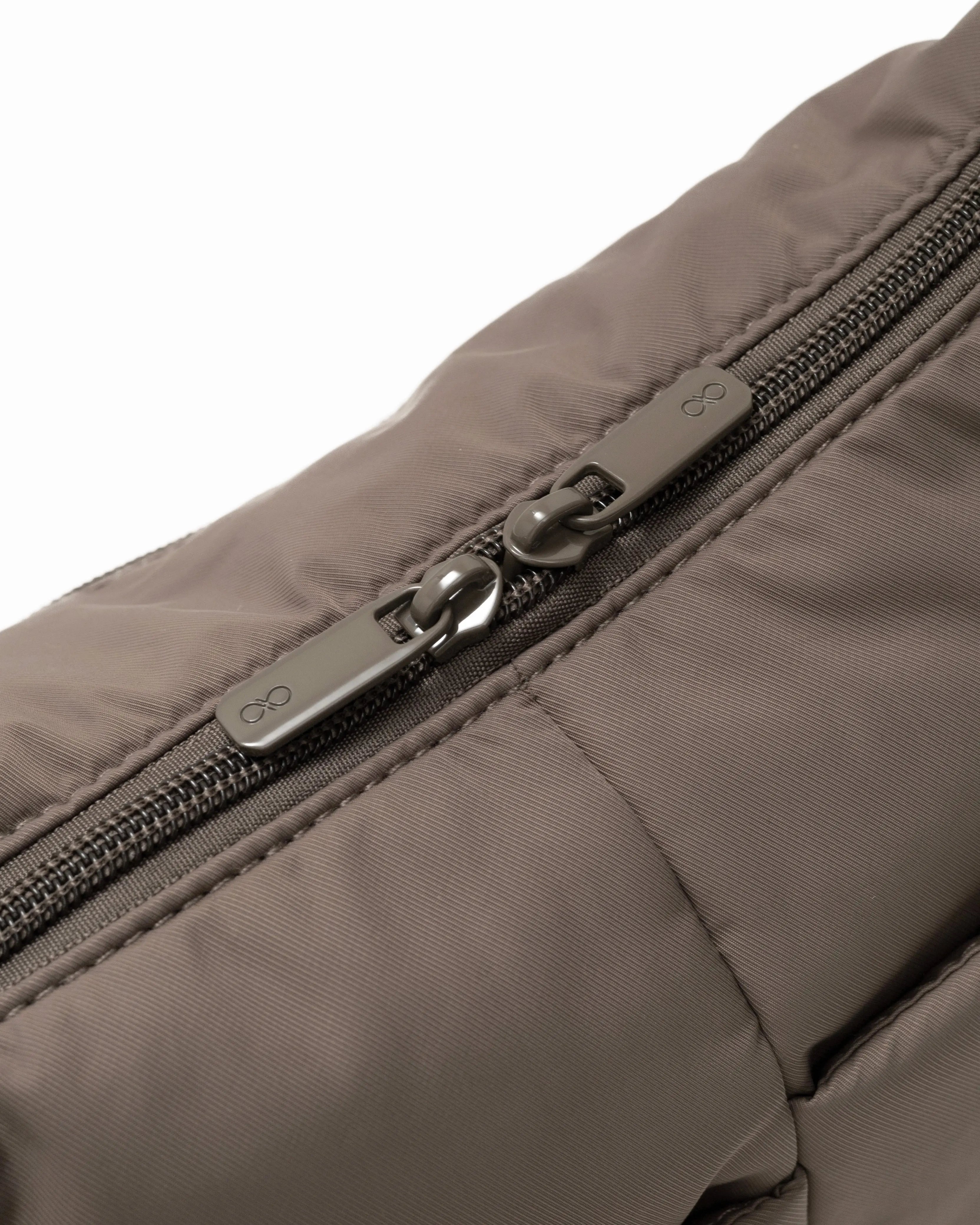 MINI SIGNATURE POCKET CROSSBODY BAG IN POSH TAUPE