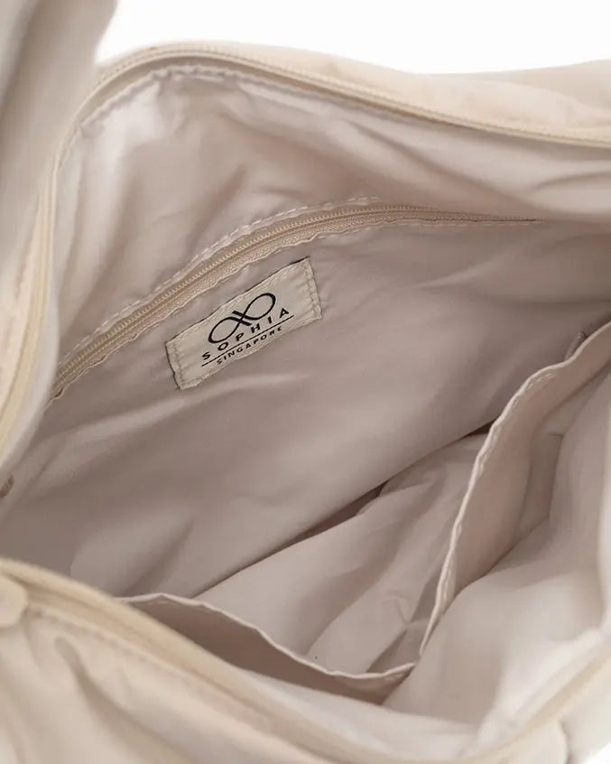 SIGNATURE POCKET CROSSBODY BAG IN POSH OAT TSL Singapore