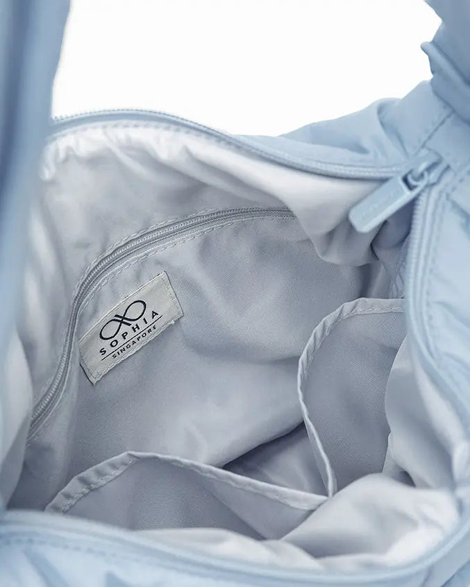 SIGNATURE POCKET CROSSBODY BAG IN POSH MISTY TSL Singapore