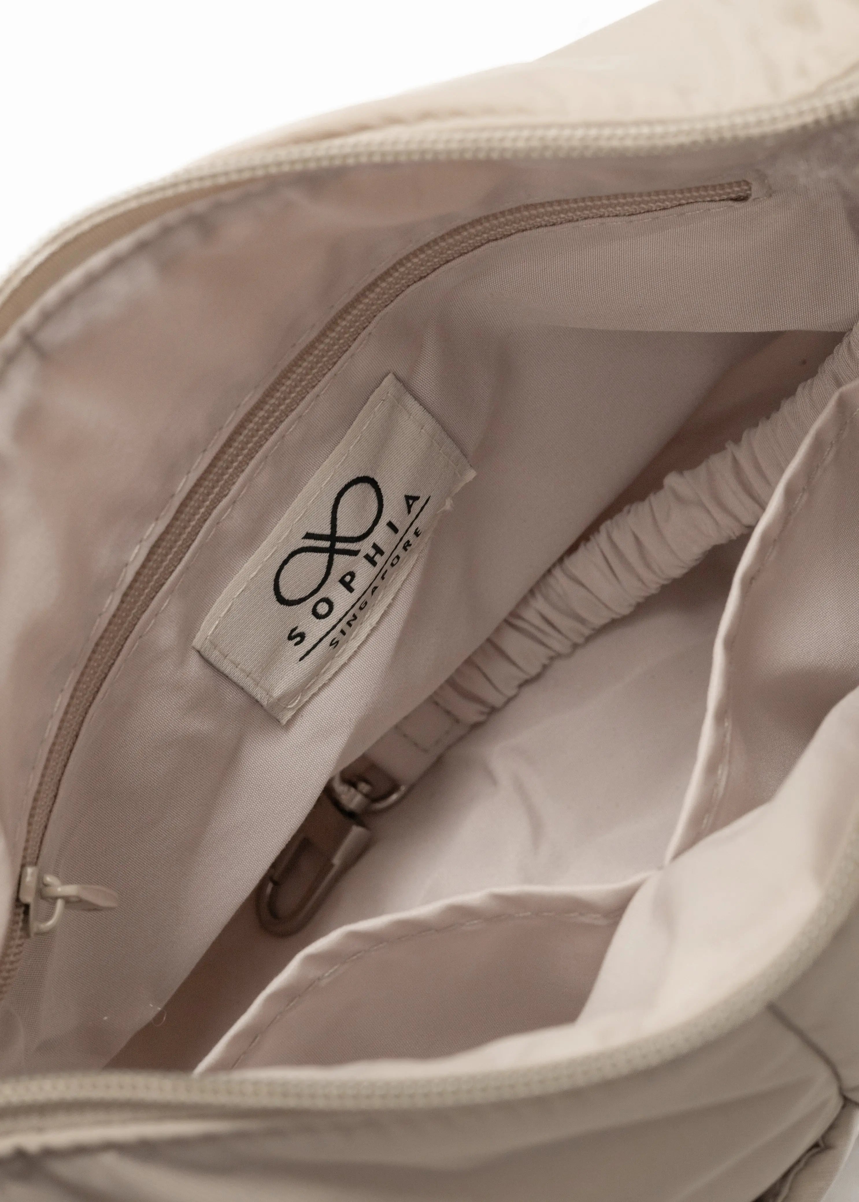MINI SIGNATURE POCKET CROSSBODY BAG IN POSH OAT 
