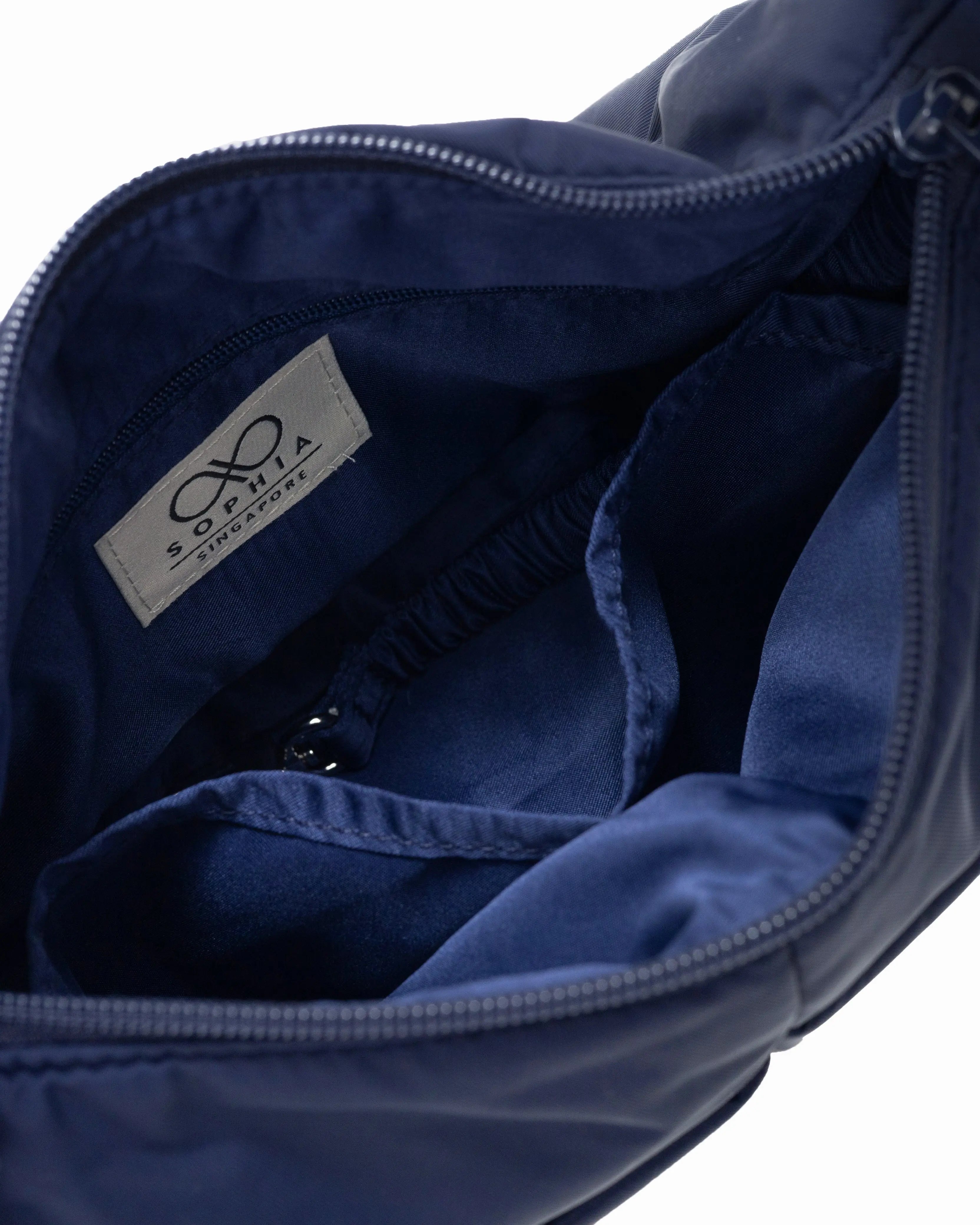 MINI SIGNATURE POCKET CROSSBODY BAG IN POSH MIDNIGHT 