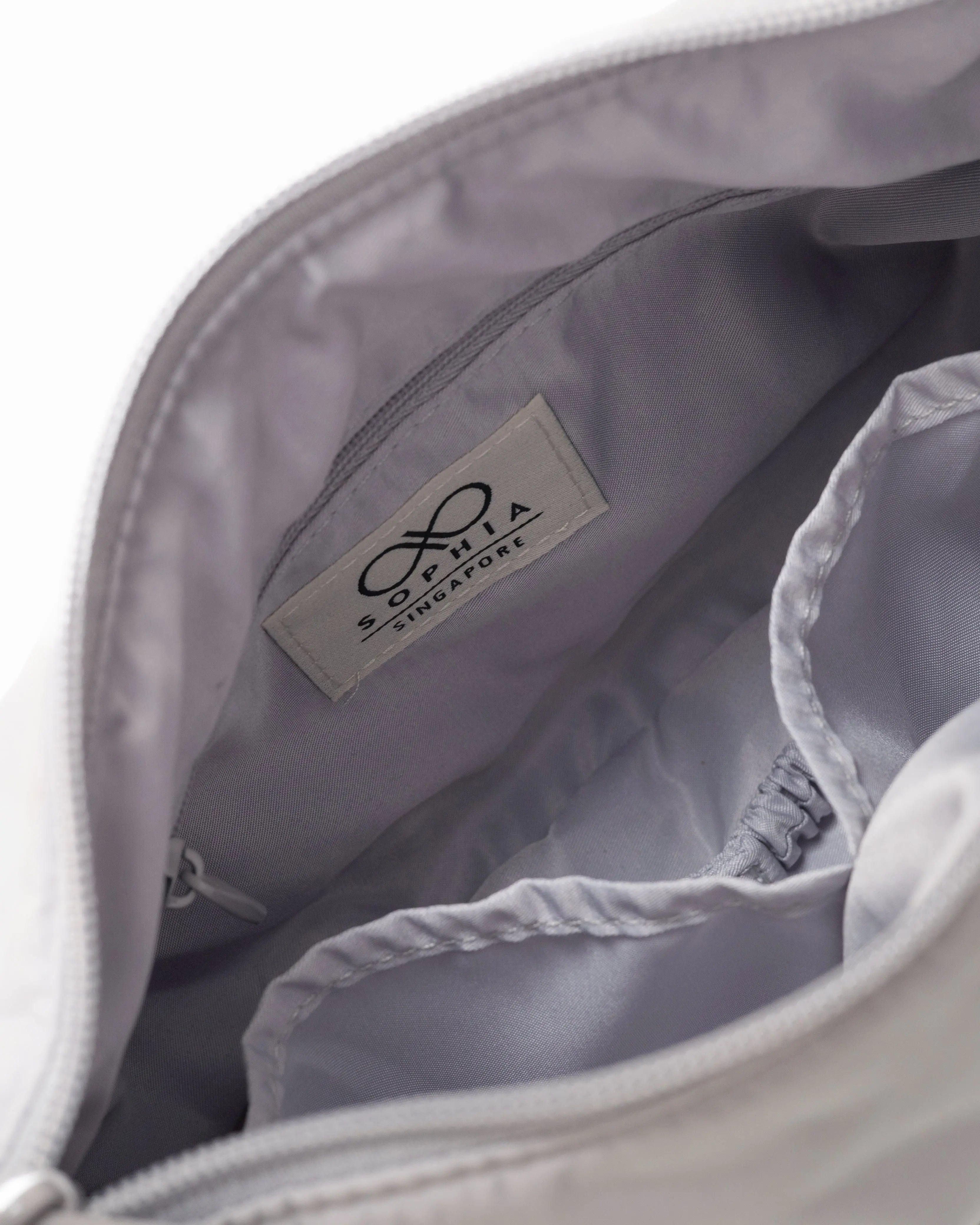 MINI SIGNATURE POCKET CROSSBODY BAG IN COSY LUXE DOVE GREY 