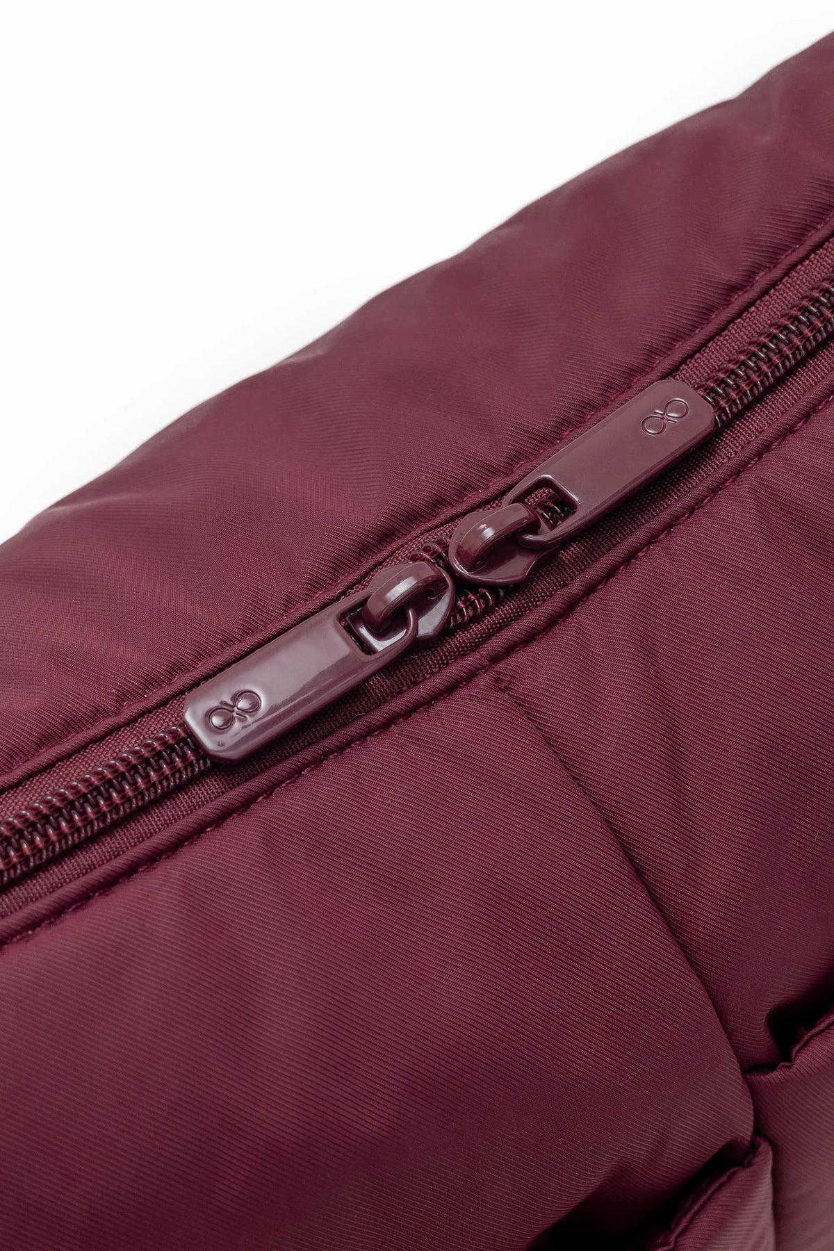 MINI SIGNATURE POCKET CROSSBODY BAG IN POSH WINE 