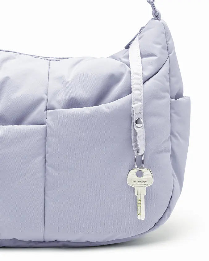 SIGNATURE POCKET CROSSBODY BAG IN COSY LUXE LILAC 