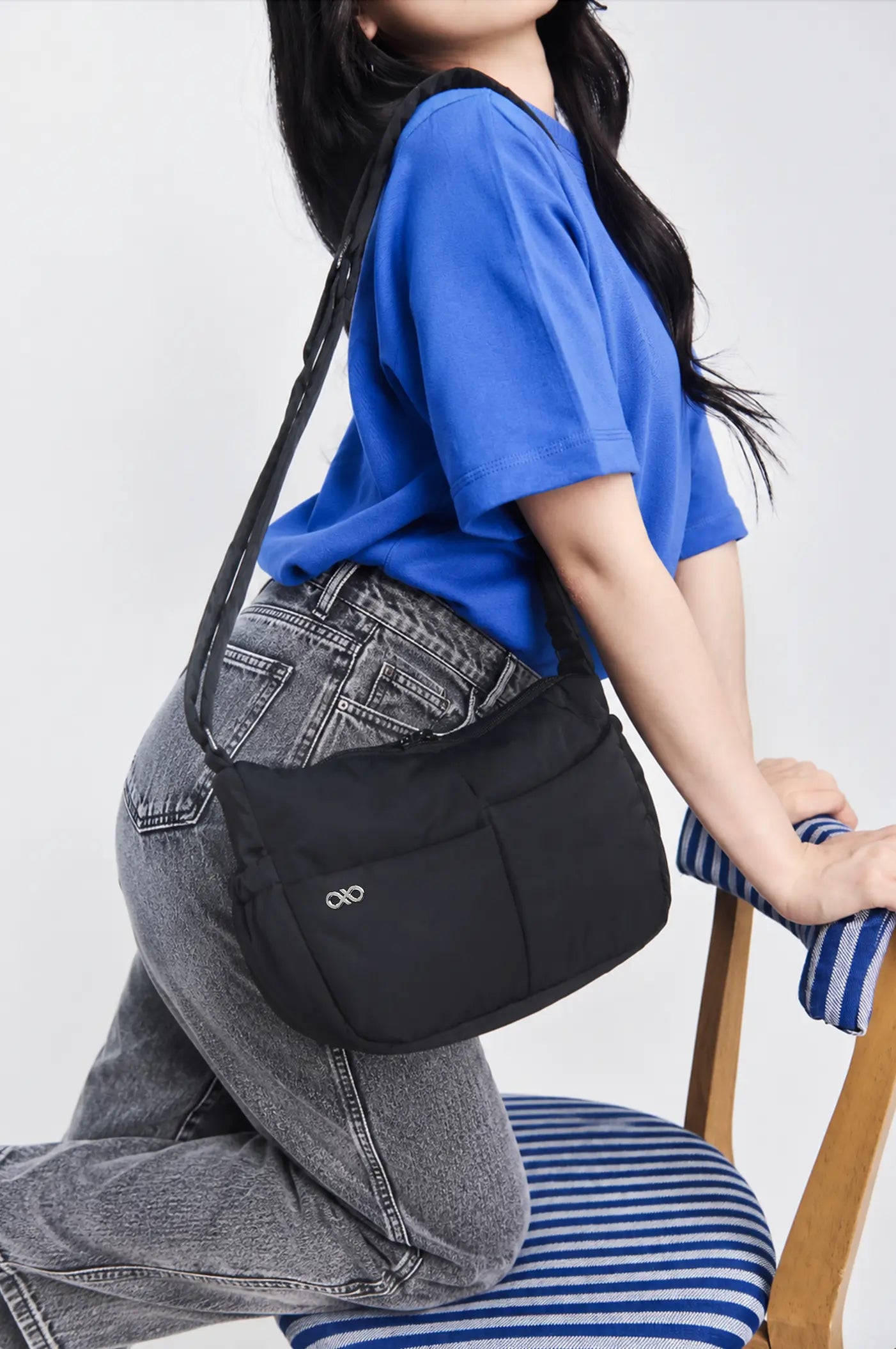 MINI SIGNATURE POCKET CROSSBODY BAG IN POSH JET BLACK 